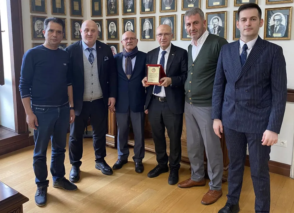 PROF. DR. FETHİ GEDİKLİ’YE HEMŞEHRİLERİNDEN PLAKET